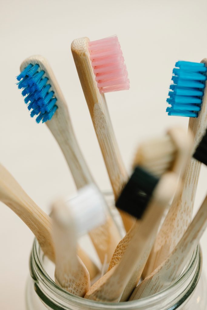 toothbrushes in a jar